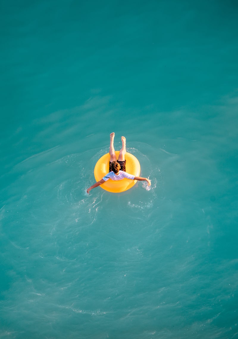Guests relaxing at Playa del Papel beach